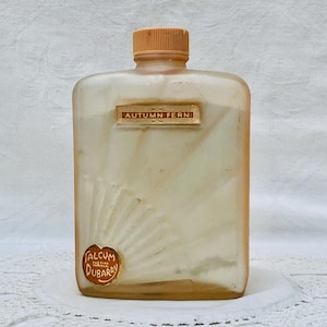 1930s Dubarry Talcum Dusting Powder, Original Tinted Glass, Embossed Art Deco Sunburst Design, Autumn Fern Scented Contents.