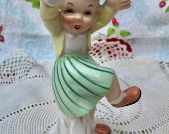 Midcentury Kitsch Ceramic Figurine Made In Japan. 1950s Girl Throwing A Ball.