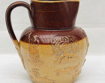 Jarra de colheita inglesa antiga com esmalte de sal do século XIX, motivos de colheita e caça.