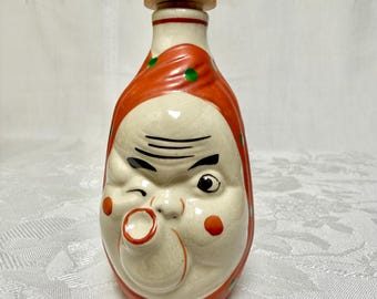 Vintage japanische, handbemalte und signierte Keramik Sake Karaffe, 2-seitige Noh-Maske, Hyottoko Okame Charakter Flasche.