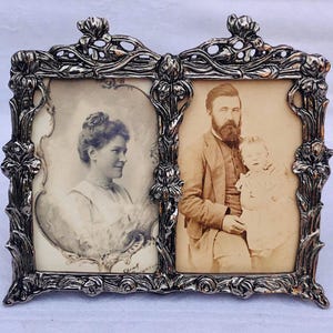 Beautiful Silver Metal Art Nouveau Frame Containing Antique Photographs.