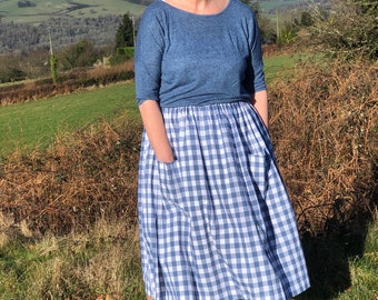 A blue gingham skirt. 100% cotton. Spring summer