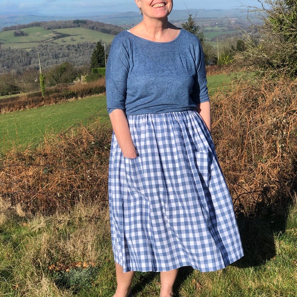 A blue gingham skirt. 100% cotton. Spring summer