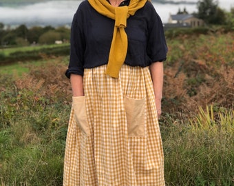 A yellow gingham skirt. 100% cotton. Country style