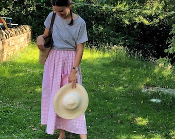 A long pink gingham skirt. 100% cotton. Country style