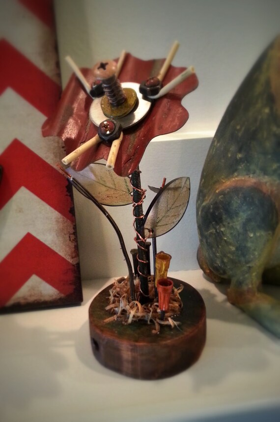 Items similar to Junk Art Flower Assemblage on Etsy