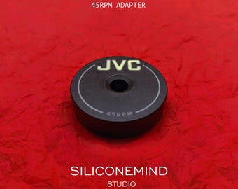 45 RPM vinyl record adapter (x1pc) for 7" single vinyl records [marked JVC]