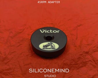 45 RPM vinyl record adapter (x1pc) for 7" single vinyl records [marked Victor]