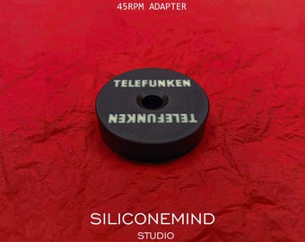 45 RPM vinyl record adapter (x1pc) for 7" single vinyl records [marked TELEFUNKEN]