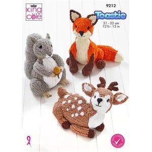 May include: Three knitted animal toys: a grey squirrel holding an acorn, an orange fox, and a brown deer with white spots. The fox measures 31-33 cm. The word "Toastie" is written in blue letters.