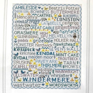 May include: A cross stitch kit with a design titled "Birds & Words Lake District". The kit contains 14 count Aida fabric, thread, a needle, chart, and instructions. The finished embroidery size is approximately 31.5 x 38.5cm.