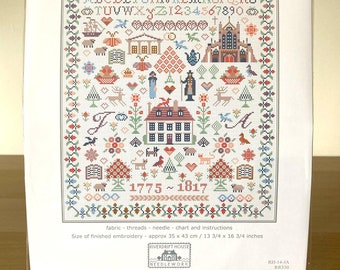 May include: A counted cross stitch sampler kit featuring a colorful design with a house, flowers, birds, and the text "Jane Austen 1775-1817".