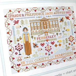 May include: A counted cross stitch kit featuring the word "PEMBERLEY" and the text "PRIDE & PREJUDICE JANE AUSTEN 1813". The design includes a building, a person, trees, and other decorative elements. The kit includes Aida fabric, thread, a needle, and a chart, approximately 15 3/4" x 12 1/2".