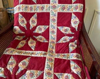 Appliquéd design on quilt, hand stitching, pieced quilt, floral quilt, large matching blocks quilt, warm colored quilt
