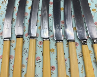 Eight celluloid knives, English vintage knives, three different companies, mix and match, ten inch knives, 4  J.Hall in Bradford,