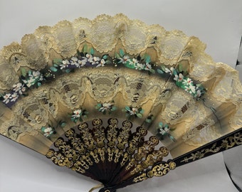 hand held vintage fan, lace edged, faux tortoise fan, was attached, fifteenninchspread, decoration, gold trimmed fan, decorative uses