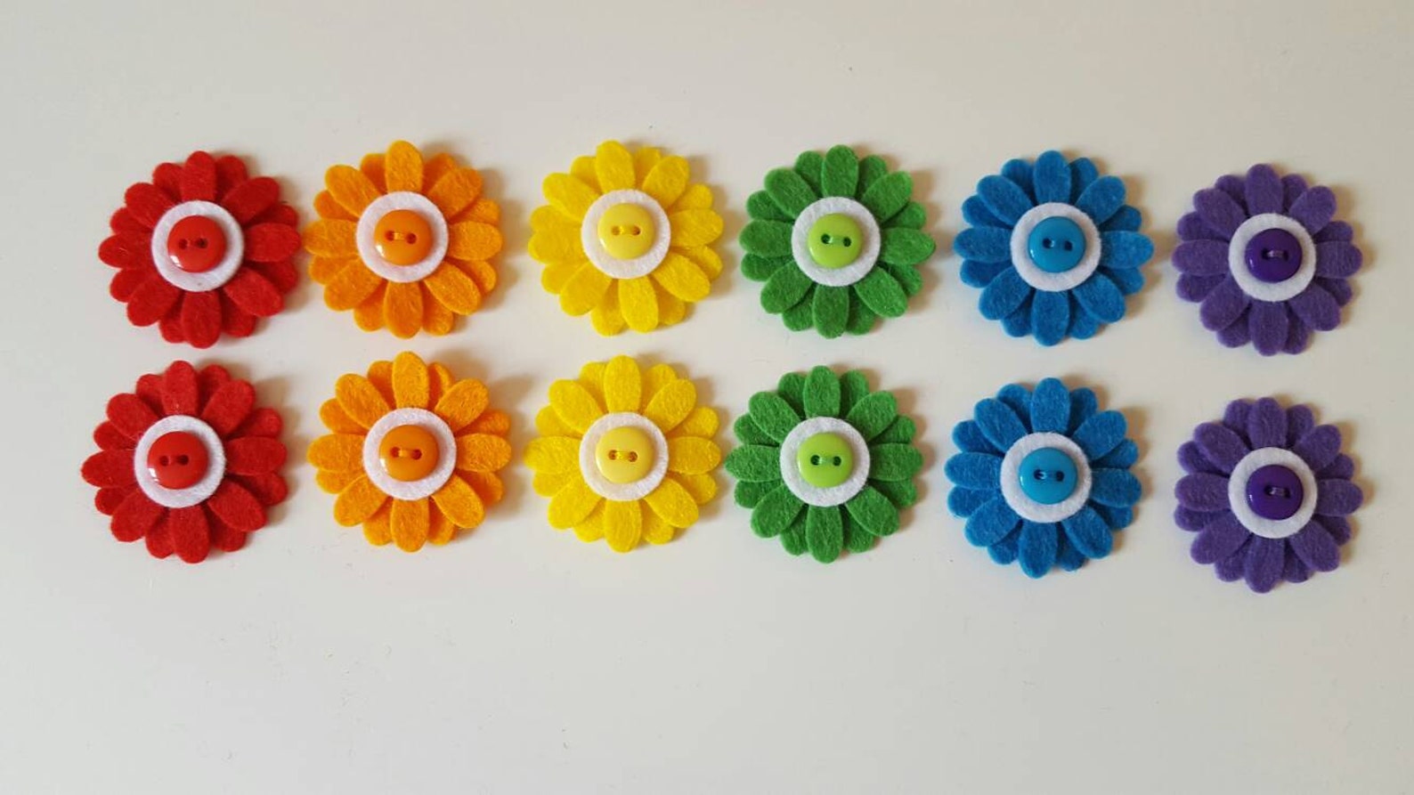 12 Handmade Daisy Embellishments. Rainbow Coloured Etsy UK