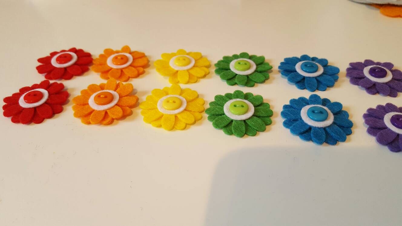 12 Handmade Daisy Embellishments. Rainbow Coloured Etsy UK
