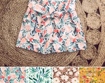 Woman paperbag shorts with pochets and belt