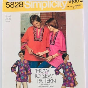 May include: Simplicity sewing pattern 5828 for a tunic with a V-neckline and decorative trim. The envelope features illustrations of two people wearing solid orange and pink tunics, and two people wearing purple floral print tunics.