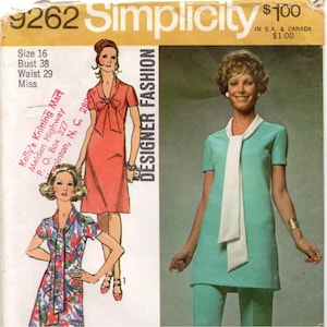 May include: Simplicity sewing pattern 9262 for a miss size 16, bust 38, waist 29. The envelope features illustrations of a dress with a tie-neck and a short-sleeved tunic with a long white scarf-style collar paired with matching pants.