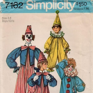 May include: A vintage Simplicity 7162 sewing pattern envelope for clown costumes in size 6-8. The illustration features three figures wearing colorful clown outfits, including a yellow jumpsuit with a cone hat and two red, white, and blue striped suits.