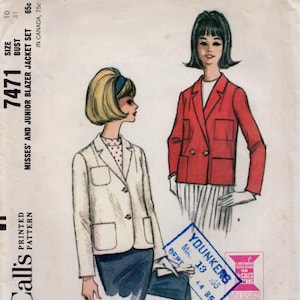 May include: A vintage McCall's 7471 sewing pattern envelope featuring illustrations of two blazers. One blazer is white with two buttons and patch pockets, worn over a red polka dot top. The other is red with two buttons and patch pockets.
