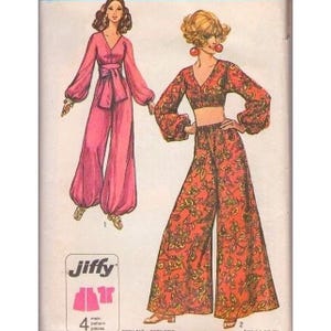May include: Vintage sewing pattern featuring two women's outfits. One is a pink jumpsuit with a wrap tie, and the other is a crop top and wide-leg pants set in a floral print. The pattern is from Jiffy.