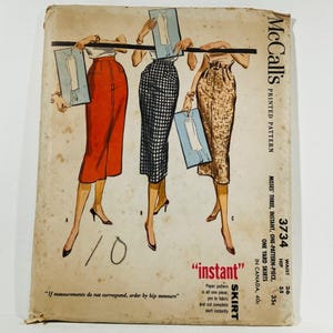 May include: Vintage McCall's printed sewing pattern for skirts. The cover features illustrations of three skirt styles in red, black and white checkered, and gold patterned fabrics. The pattern number is 3734, with waist and hip measurements.