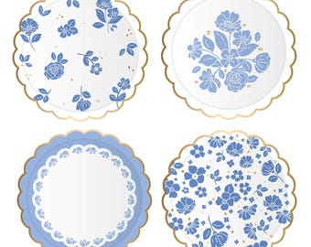 May include: Four blue and white floral patterned paper plates with gold trim. The plates have different floral designs.