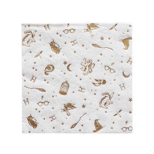 May include: White paper napkins with a gold foil pattern of Harry Potter themed symbols, including the Hogwarts crest, a golden snitch, a broom, and the letter "H".