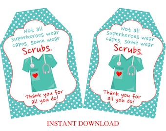 May include: Two printable gift tags with a teal polka dot background. The tags feature a cartoon illustration of a medical scrub top with a stethoscope and a red heart. The text on the tags reads "Not all superheroes wear capes, some wear Scrubs. Thank you for all you do!"