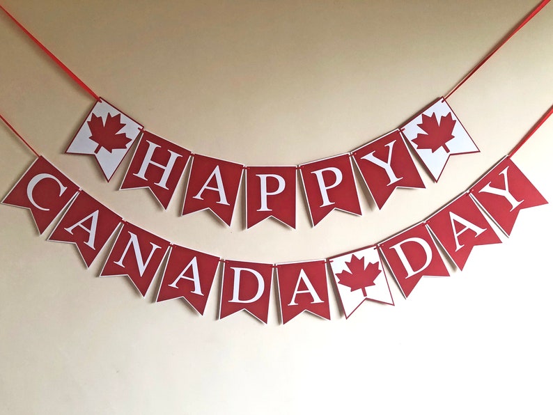 May include: Red and white banner with the text "Happy Canada Day" and maple leaf designs.