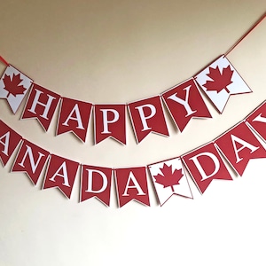 May include: Red and white banner with the text "Happy Canada Day" in white letters. The banner has maple leaf cutouts.