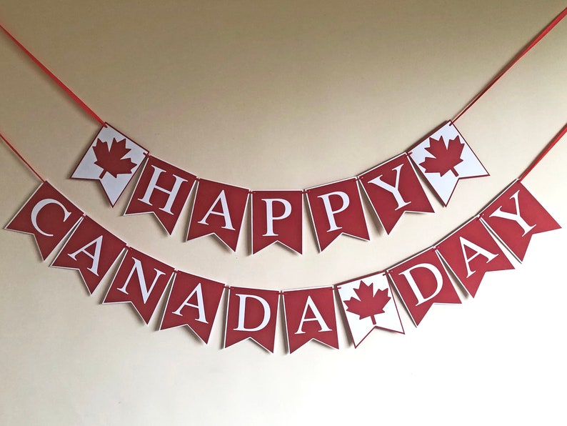 May include: Red and white bunting with the words "Happy Canada Day" and a maple leaf design.