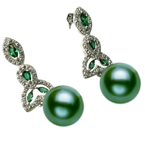 May include: A pair of dangling earrings with a silver-tone metal design. The earrings feature green pearlescent orbs and are accented with small green and clear gemstones. The earrings are set against a white background.
