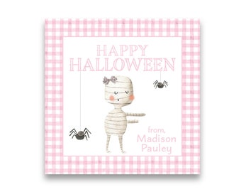 May include: Pink and white gingham patterned card with a mummy illustration and the text "Happy Halloween" and "from, Madison Pauley".