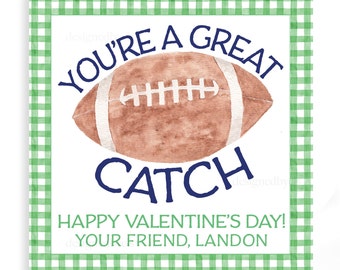 May include: A green and white checkered card with a brown football and blue text that reads "You're a great catch. Happy Valentine's Day! Your friend, Landon."