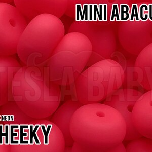 May include: A close-up of a pile of bright red silicone beads, labeled "MINI ABACUS" and "CHEEKY DARK NEON".