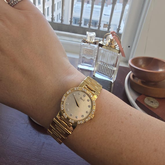Vintage 18k Piaget Dancer Diamond Dial and Bezel Ladies Watch View 2