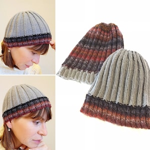 May include: Two knitted hats, one grey with a burgundy and black stripe, and one grey with a multi-coloured stripe.