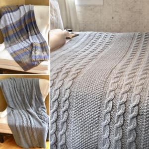 May include: A grey cable knit throw blanket with a textured pattern. The blanket is folded and draped over a chair.