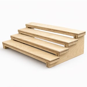 May include: A four-tiered, light-colored wooden display stand. Each level is a rectangular platform, with a slightly raised edge. The stand is ideal for showcasing small items, with a clean, minimalist design.