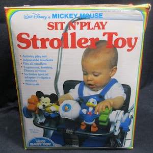 No.3463) Disney Mickey Mouse Sit N Play Stroller Toy. Over 30 years old. Mint condition. In the box.