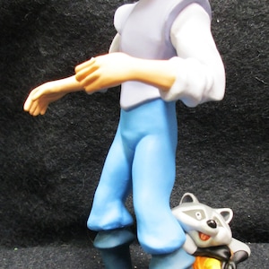 No.2180a}  Disney Hallmark Christmas Ornaments Captain John Smith and Meeko.  Pocahontas. Mint Condition. 2180a