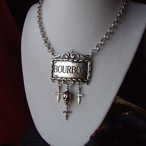 Gothic Bourbon Memento Mori Pendant Necklace / &#39;&#39;Old West&#39;&#39; Style Bourbon Gothic Necklace / Steampunk Liquor Label Skull and Cross Pendant