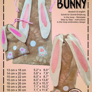 Könnte beinhalten: Eine braune Kordeltasche mit Hasenohren und Pfotenabdrücken. Die Tasche ist in 9 Größen erhältlich, von 13 cm x 20 cm bis 20 cm x 36 cm. Das Design heißt "Bunny" und ist sowohl in Englisch als auch in Deutsch verfügbar.