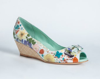 Floral Power: Patent pending Shoes with real pressed flowers.Every single pair is uniquely made.Leather insole,outsole and lining;Poron foam