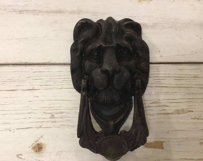 Antique lion door knocker