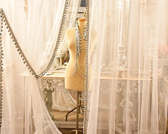 Pair of curtains in tulle and precious Italian trimmings